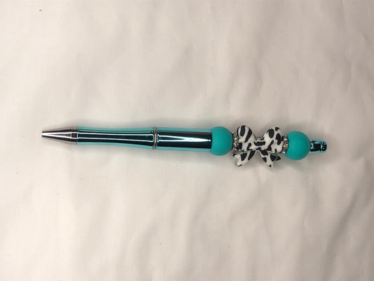 cow print bow and teal beaded pen